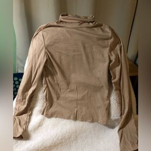 Womenswear lightweight turtleneck in creamy beige